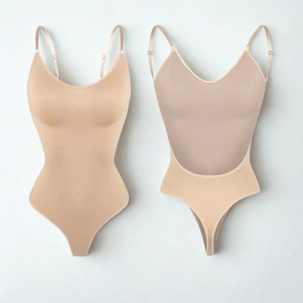 Two beige swimsuits on a light gray background